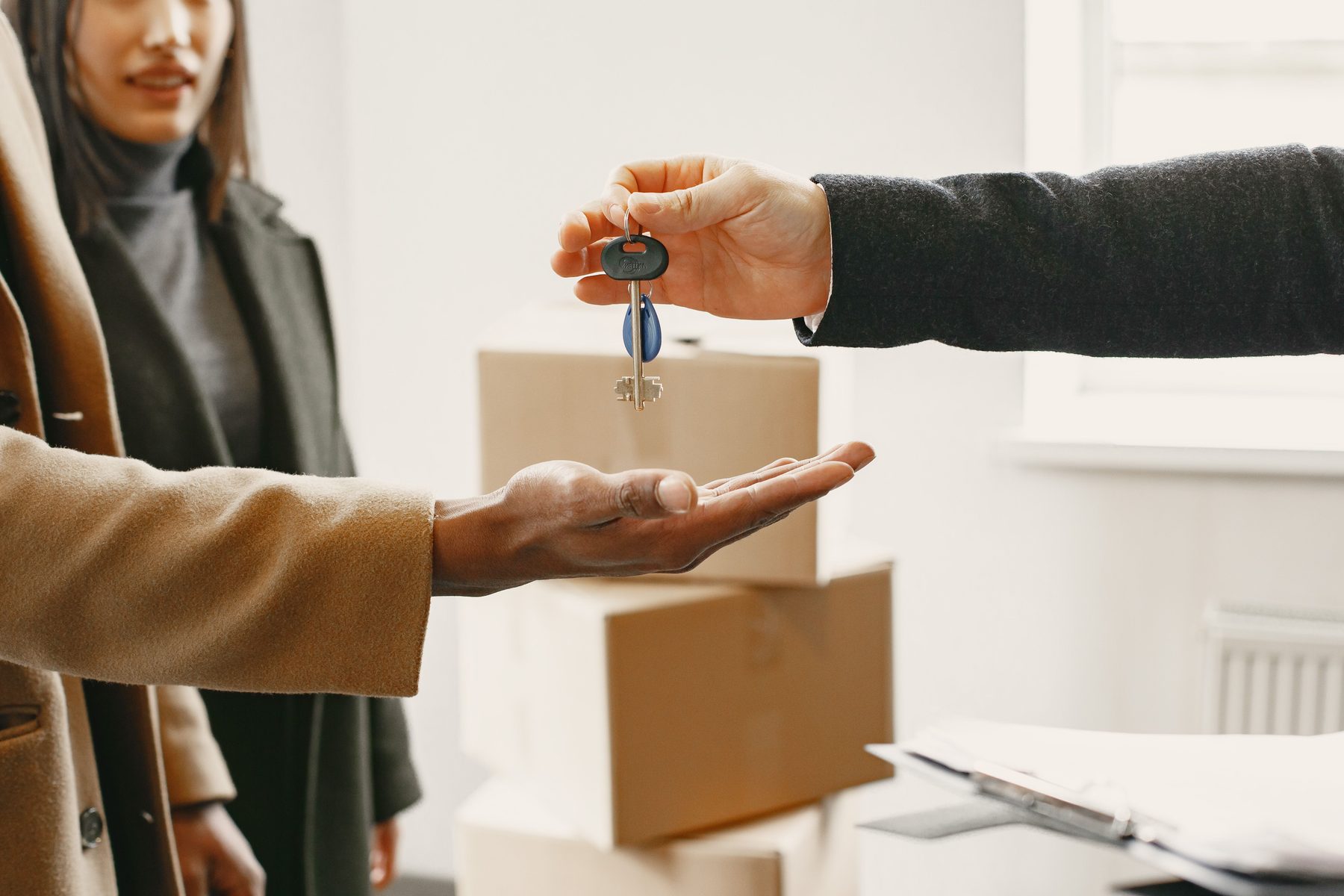 New homeowner receiving house keys